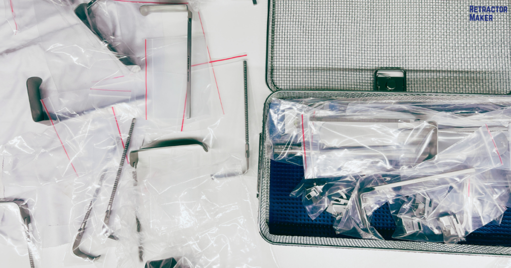 Double-tier sterilization tray holding Bookwalter retractor blades and mounting accessories